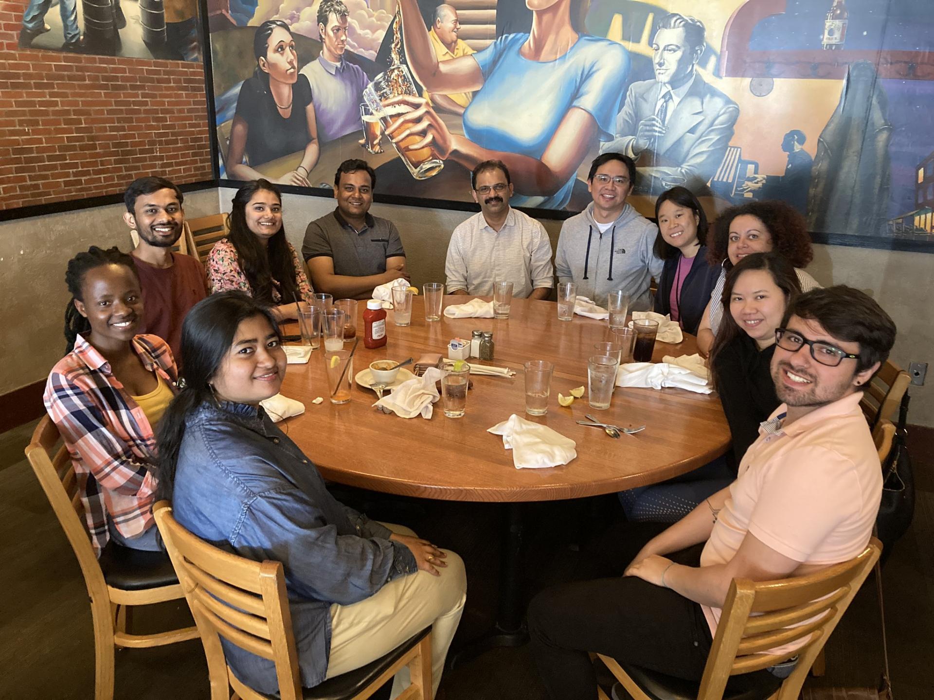 Current & Former members of the Louis Lab have lunch together.